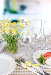 Table setting with chamomiles