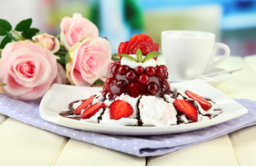 Tasty jelly dessert with fresh berries, on bright background