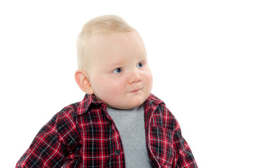Young baby boy in plaid shirt