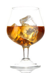 Brandy glass with ice isolated on white
