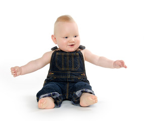 Baby in overalls