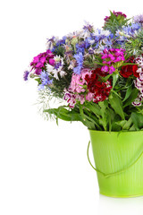 Beautiful bouquet in pail isolated on white