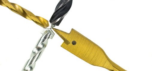 Various type of drill bits over white background