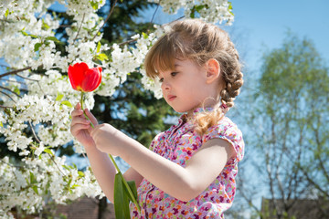 little girl with flowers