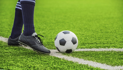 soccer ball with his feet