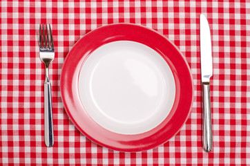 Teller mit Messer und Gabel