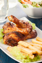 Chicken drumsticks with prepared potatoes