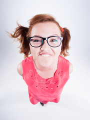 pretty girl making funny geek face