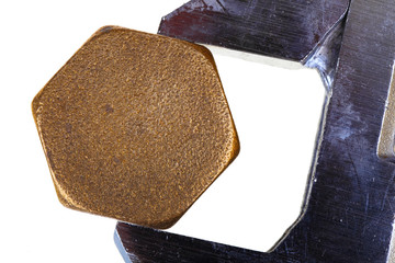 Adjustable wrench and hexagonal cap