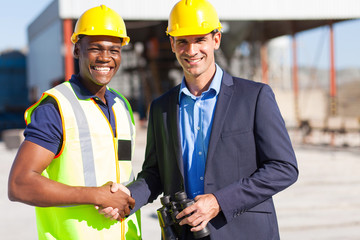 industrial manager and worker outdoors