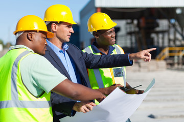 architect and construction workers