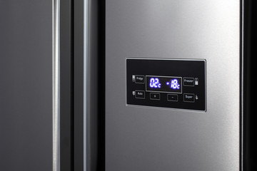 Detail of side-by-side steel refrigerator.