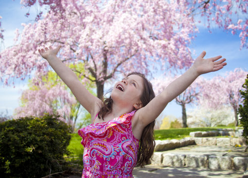 Young Girl Taking A Deep Breath Enjoying Freedom