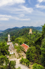 Fototapeta na wymiar statue Goddess of Mercy Kuan Yin in mountains Thailand