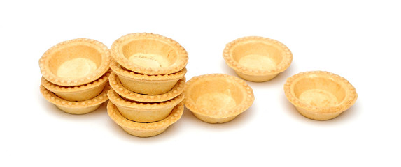 empty tartlets isolated on white