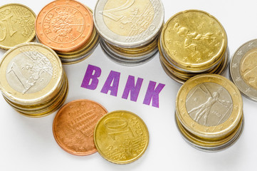 Many Euro coins and violet 