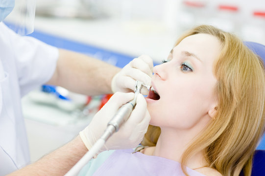 medical dentist procedure of teeth polishing with cleaning 
