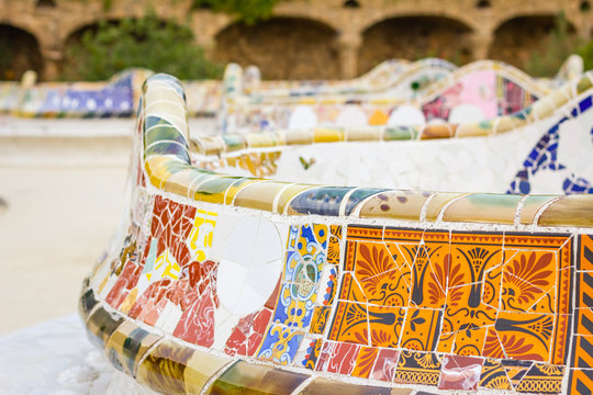 Detail of colorful mosaic in a bench of park Guell, designed by