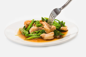 Prawns with broccoli fried sauce on white dish