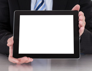Businessman Holding Digital Tablet