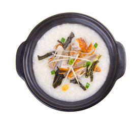 Traditional chinese pork porridge rice gruel served in claypot