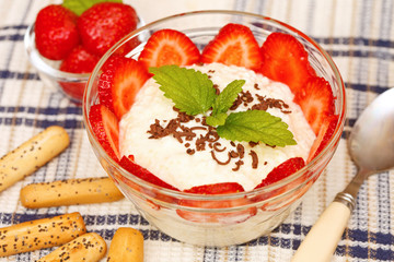 Dessert of cottage cheese and strawberries