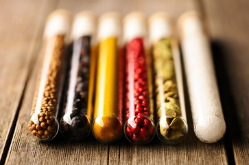 Spices in beakers close-up