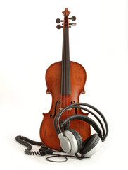 violin and earphones isolated on a white