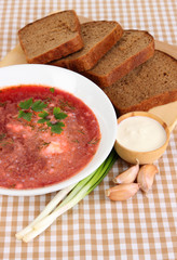 Delicious borsch on table close-up