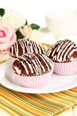 Sweet chocolate cupcakes close up