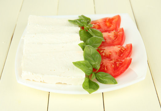 Sheep milk cheese, with basil and tomato