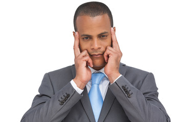 Businessman putting his fingers on his temples