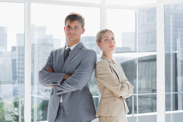 Business colleagues standing in their office