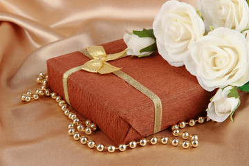 Romantic parcel on gold cloth background