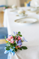 Table decorated with flowers, wedding decorations..