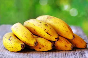 Yellow bananas on table