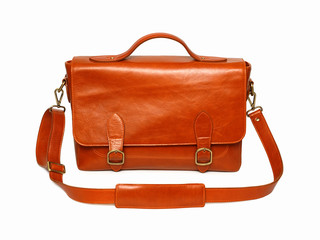 Brown leather bag on white background