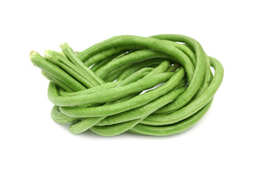 Green lentils,beans tied and coiled on white background
