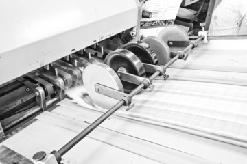 Folding machine working in printing industry