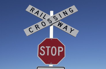 signs railway crossing stop sign