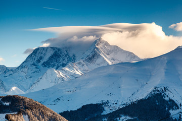 Fototapeta na wymiar Mountain Peak and Ski Slope near Megeve in French Alps, France