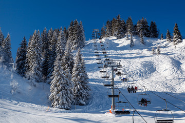 Sunny Ski Slope and Ski Lift near Megeve in French Alps, France
