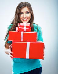 Portrait of young happy smiling woman hold red gift box. Isolat