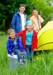 Fototapeta na wymiar Summer child camping in tent