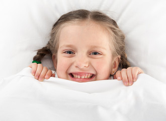 cheerful girl in bed