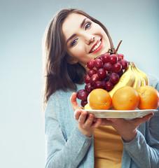 Woman fruit diet concept portrait with tropic fruits