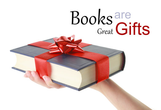 Woman's Hand Holding A Book For Gift