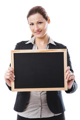 Business woman holding a chalk board