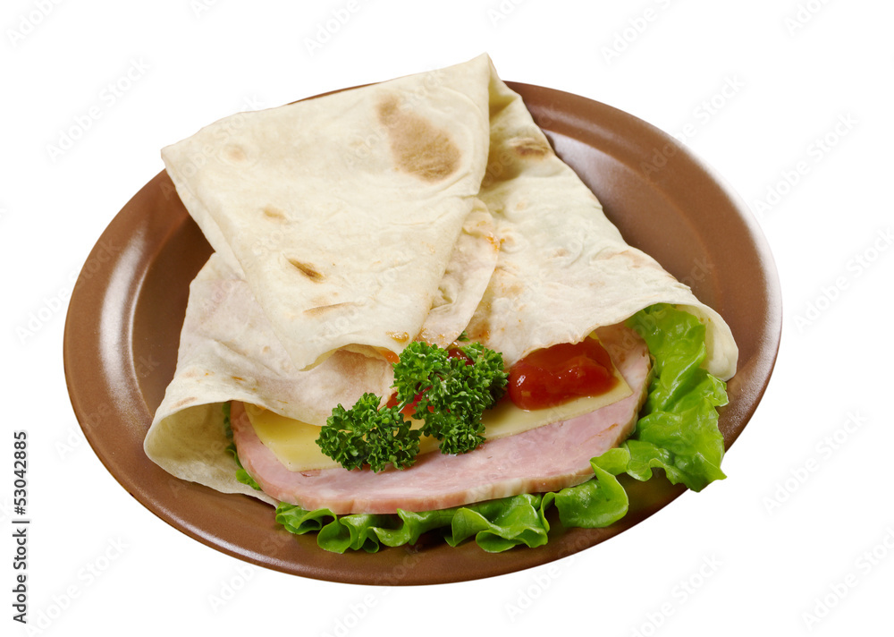 Poster pita sandwich with cheese,ham