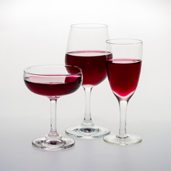 Three glass with red wine